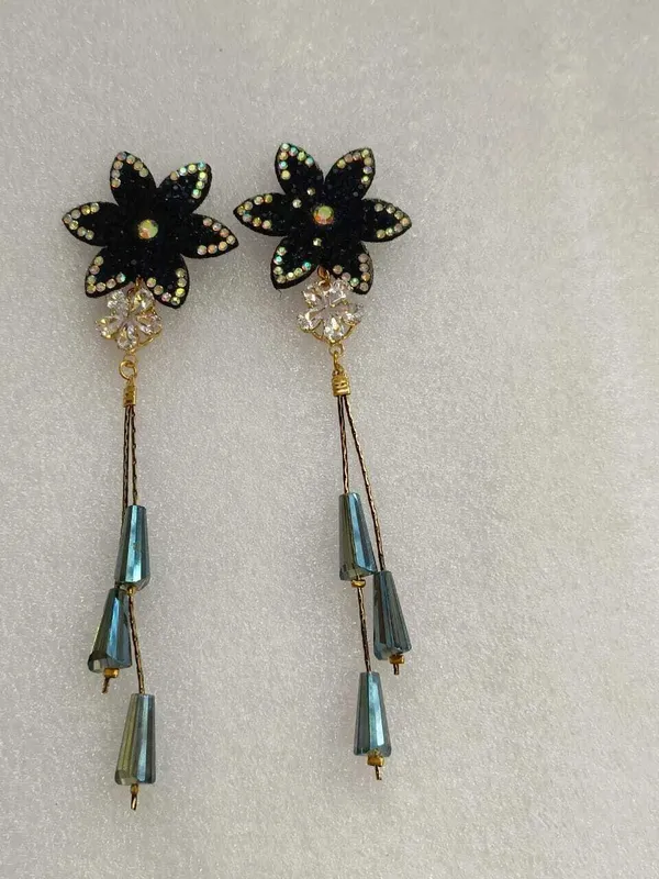 Dazzle_and_delight_with_our_radiant_star_earrings_Cubic_Zirconia_Alloy_Drops_&_Danglers