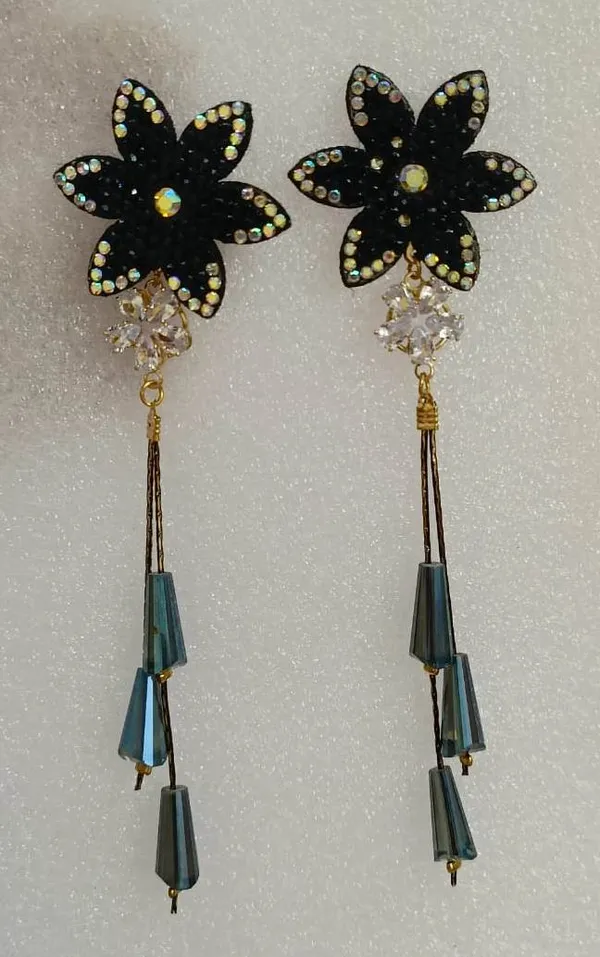 Dazzle_and_delight_with_our_radiant_star_earrings_Cubic_Zirconia_Alloy_Drops_&_Danglers