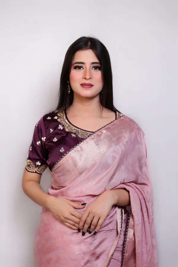 Pink_Organza_Saree_With_Embellished_Purple_Blouse