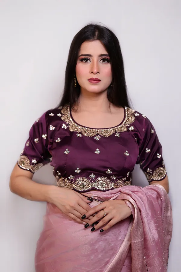 Pink_Organza_Saree_With_Embellished_Purple_Blouse