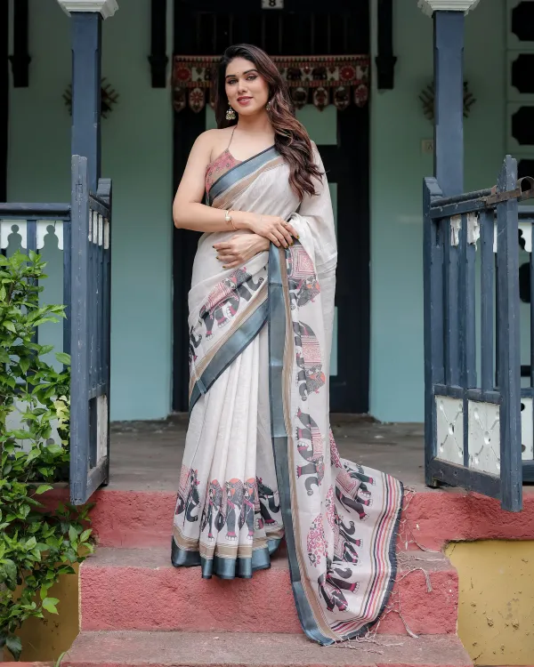 Cream_Pure_Cotton_Linen_Saree_With_Elephant_Motif_And_Tassel_Detailing_For_Women