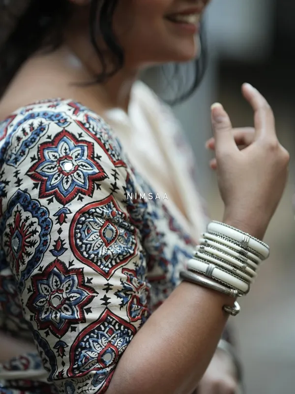 Traditional_Cream_Ajrakh_Print_Motifs_And_Real_Mirror_Work_Detailing.