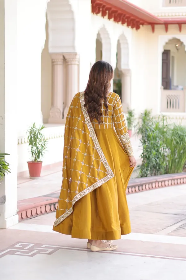 Yellow_Ncvichitra_Gowns_For_Women