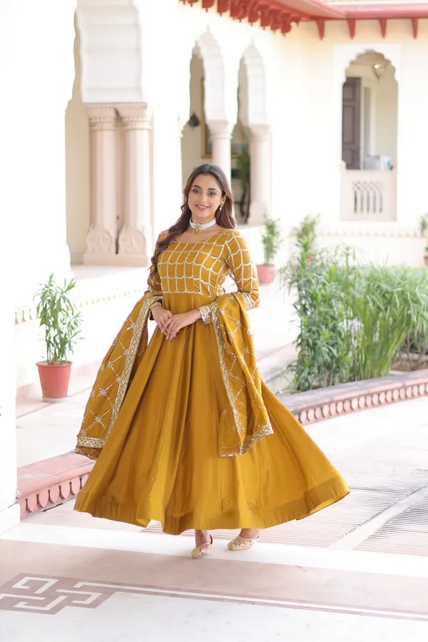 Yellow_Ncvichitra_Gowns_For_Women