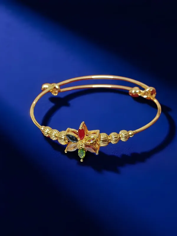 Gold_Toned_Bracelet_With_Central_Star_Shaped_Motiff_And_Textured_Coil_Shaped_Bracelet_Pack_Of_2