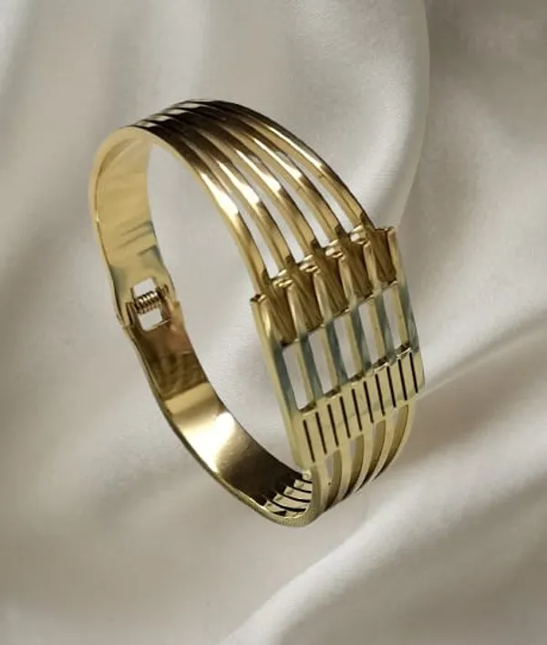Gold_Toned_Metal_Bracelet_With_Parallel,_Ribbed_Bars