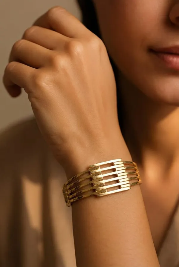 Gold_Toned_Metal_Bracelet_With_Parallel,_Ribbed_Bars