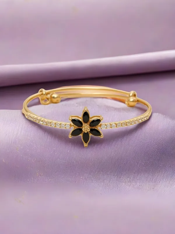 Gold_Toned_Bracelet_With_Central_Star_Shaped_Motiff_Of_Black_Gemstones_In_Floral_Setting