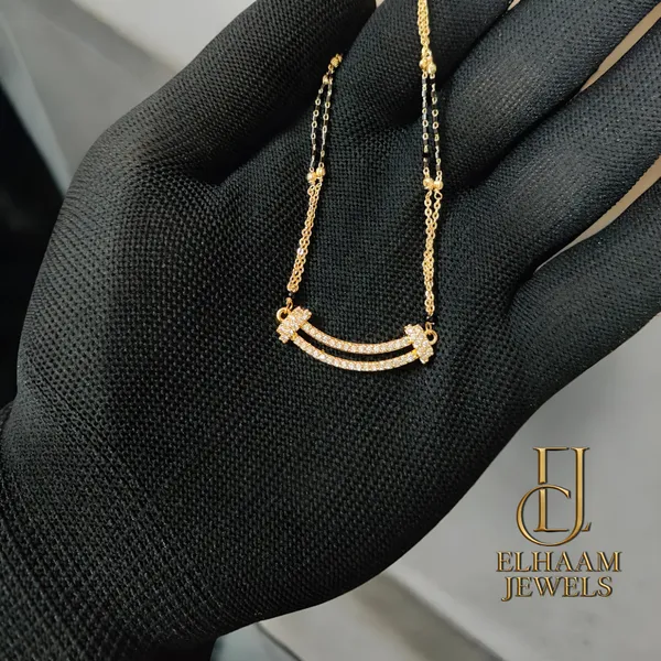 Gold_Traditional_Rakhi_Mangalsutra_For_Women