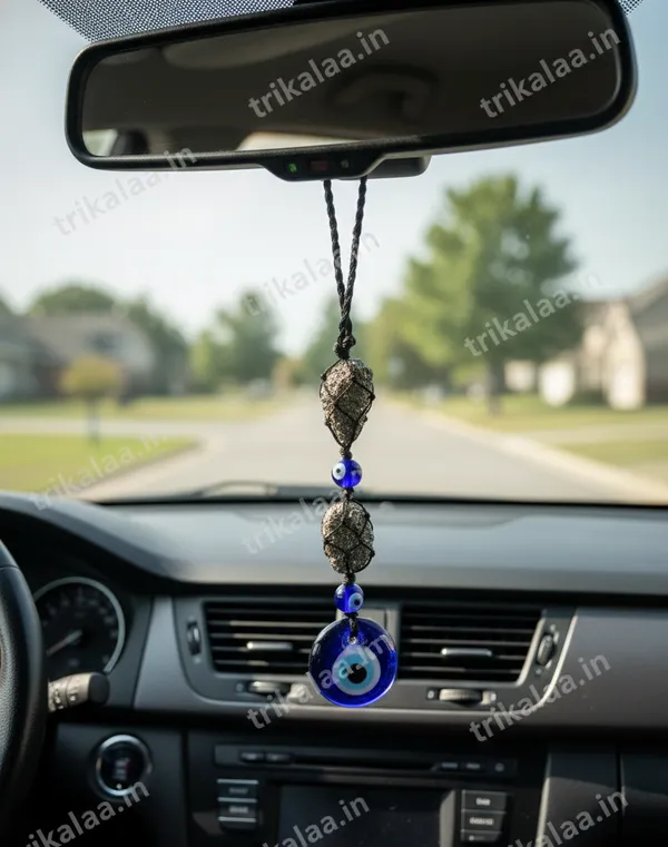 Pyrite_Cluster_Hanging_With_Evil_Eye_Charm_–_Protection_&_Prosperity_Guard_(Car_&_Home)