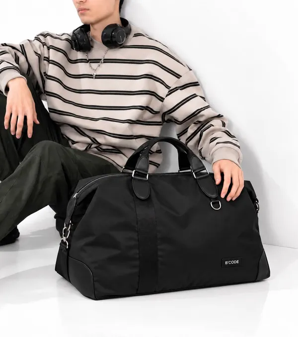 Stride_Lite_Expandable_Travel_Duffel_Bag_for_Men_&_Women_–_Oxford_Nylon_Water-Resistant_Weekender_Bag_with_Trolley_Sleeve,_4-Inch_Expandable_Capacity,_Waterproof_Lining,_Large_22-Inch_Overnight_Gym_&_Cabin_Luggage_Bag