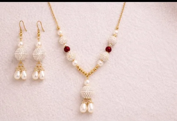Handcrafted_Elegant_Pearl_Drop_Earrings_With_Gold_Tone_Finish