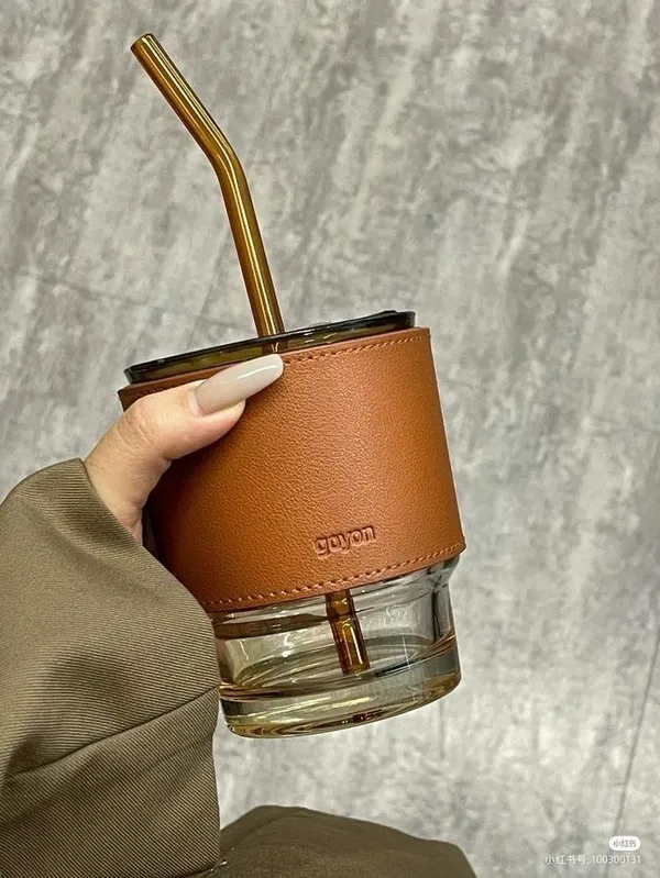 Multicolor_Glass_Tumbler_With_Leather_Sleeve,_Amber_Straw_Lid,_350Ml_Capacity