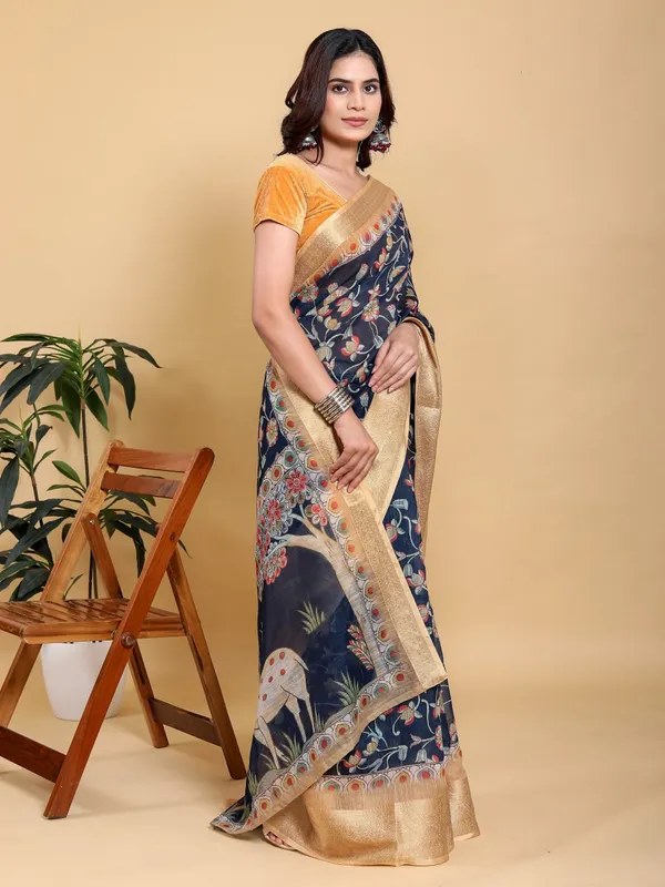 Navy_Blue_Elegant_Floral_Print_Deer_Motif_And_Zari_Border_Saree_For_Women