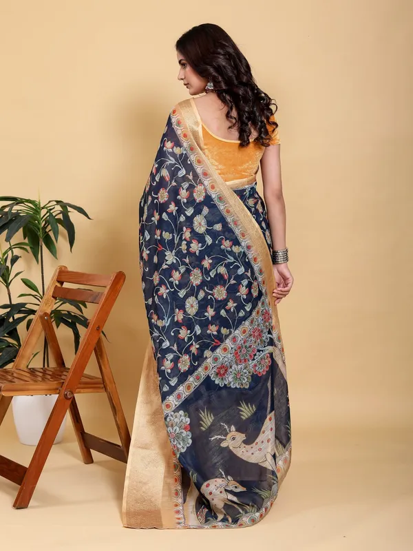 Navy_Blue_Elegant_Floral_Print_Deer_Motif_And_Zari_Border_Saree_For_Women