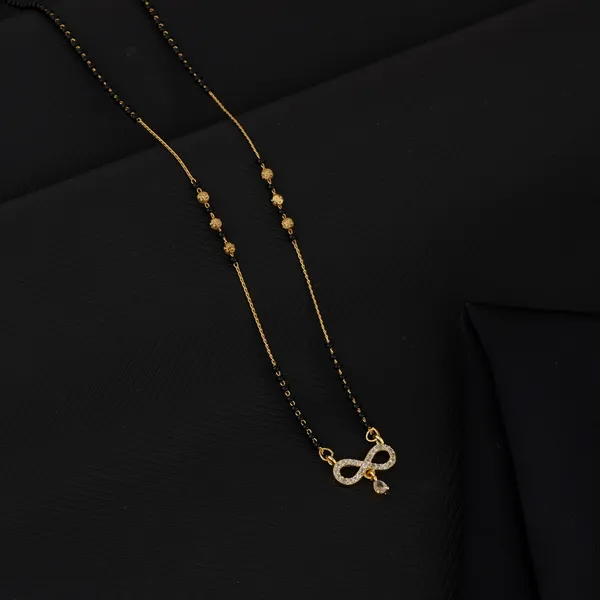 Elegant_Gold_Tone_Mangalsutra_Chain_With_Crystal_Pendant.