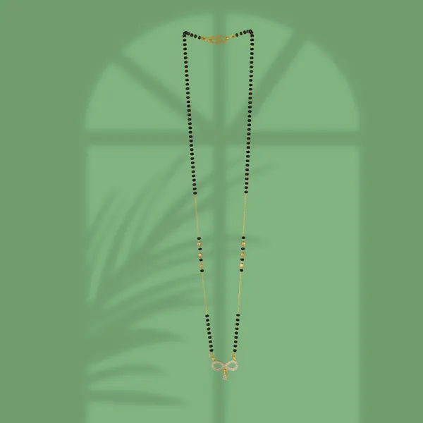 Elegant_Gold_Tone_Mangalsutra_Chain_With_Crystal_Pendant.