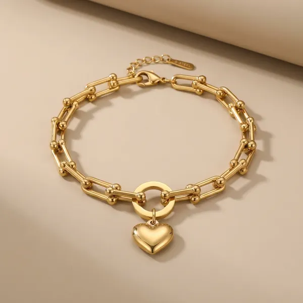 Kivu_Zivu_Exclusive_Collection_Gold-Toned_Heart_Charm_Chain_Bracelet_Set