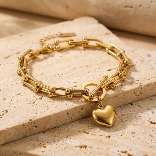 Kivu_Zivu_Exclusive_Collection_Gold-Toned_Heart_Charm_Chain_Bracelet_Set