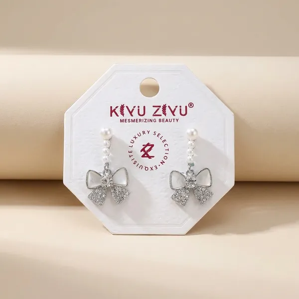 Pearl_Bow_Earrings_-_Elegant_Drop_Earrings_With_Crystal_Embellishments