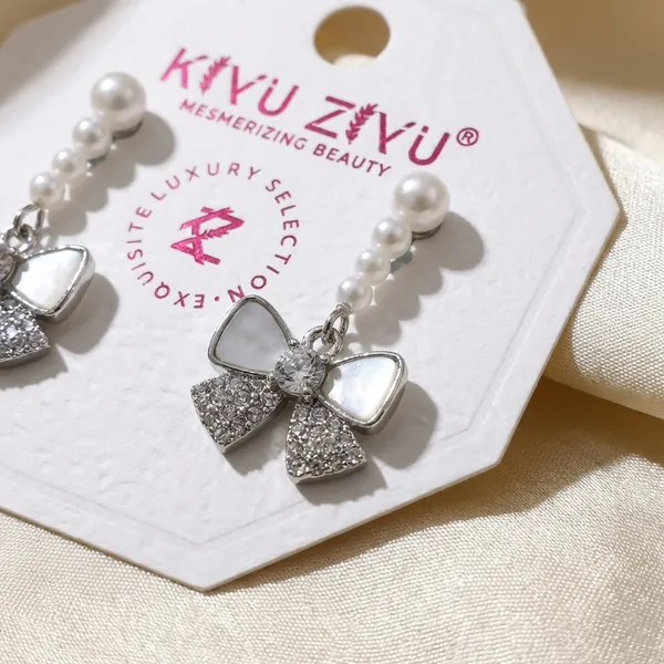 Pearl_Bow_Earrings_-_Elegant_Drop_Earrings_With_Crystal_Embellishments