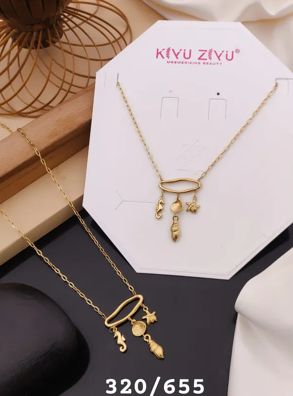 Gold-Toned_Charm_Pendant_Necklace_With_Hanging_Accents
