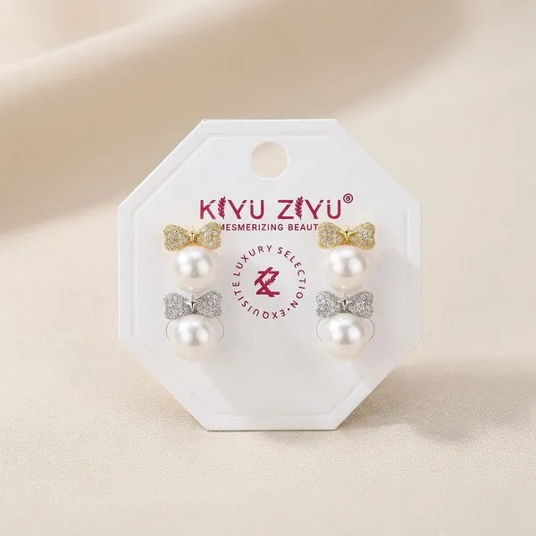 Pearl_Drop_Earrings_With_Textured_Gold_Bow