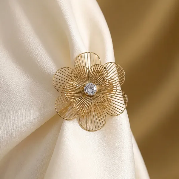 Gold-Toned_Flower_Brooch_With_Crystal_Center