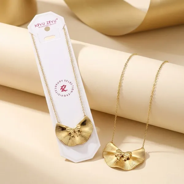Golden_Crescent_Moon_Pendant_Necklace_With_Bow_Design