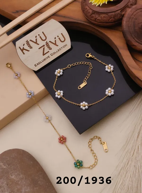 Golden_Chain_Bracelets_With_Floral_Charms_-_Set_Of_3