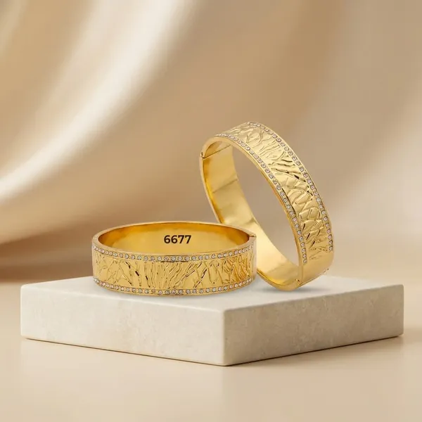 Kiyu_Zyu_Exclusive_Collection_Gold-Toned_Textured_Bangle_Pair_With_Crystal_Embellishments