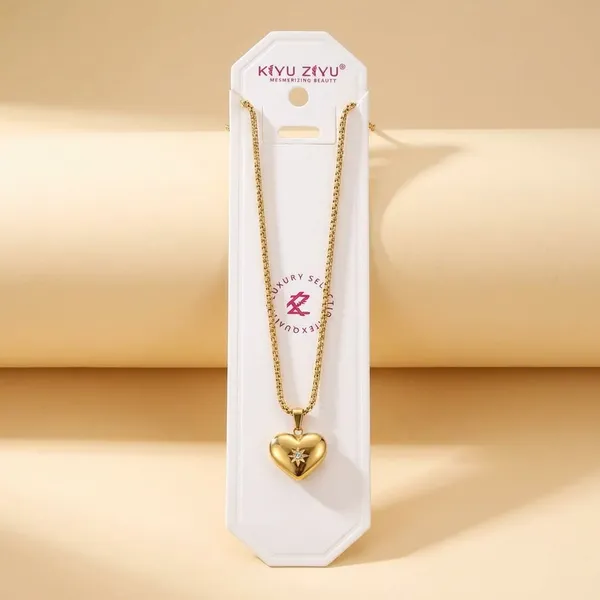 Gold_Heart_Pendant_Necklace_With_Star_Accent