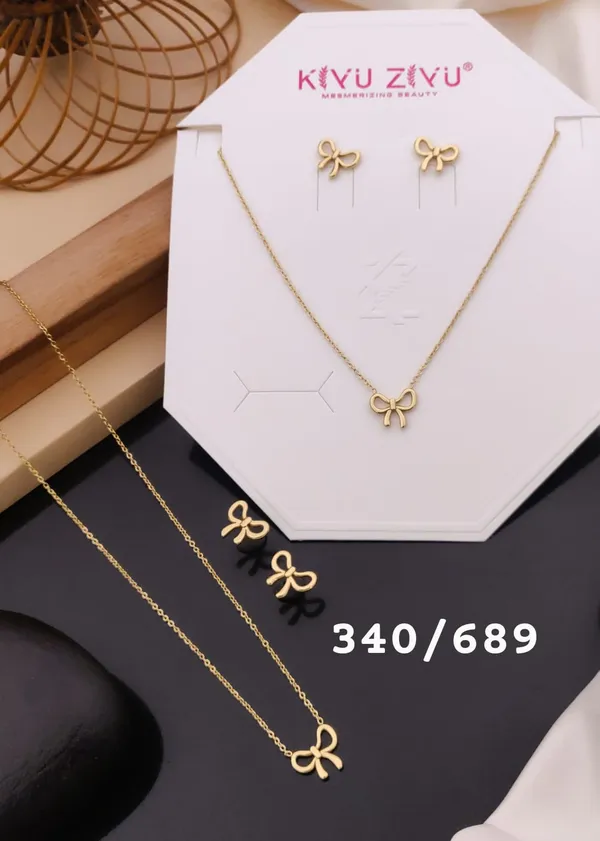 Gold-Toned_Bow_Design_Jewelry_Set_-_Necklace_And_Earrings