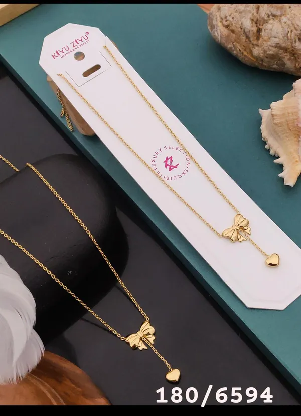 Golden_Butterfly_Pendant_Necklace_With_Heart_Charm