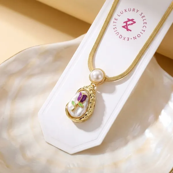 Gold_Chain_Necklace_With_Pearl_And_Pink_Gemstone_Pendant