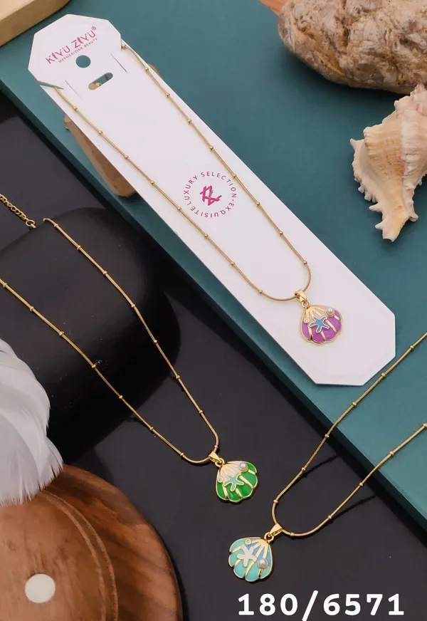 Tropical_Leaf_Pendant_Necklace_Set_-_Set_Of_3_Gold-Tone_Chain_Necklaces_With_Colorful_Enamel_Monstera_Leaf_Charms