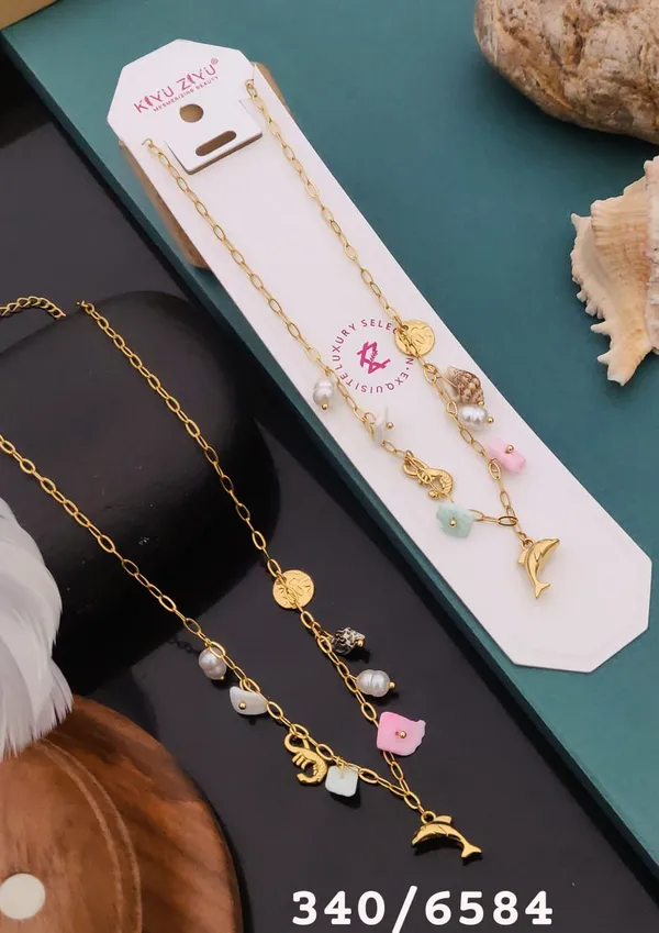Dolphin_&_Flower_Charm_Necklace_With_Beads_-_Gold_Tone_Chain
