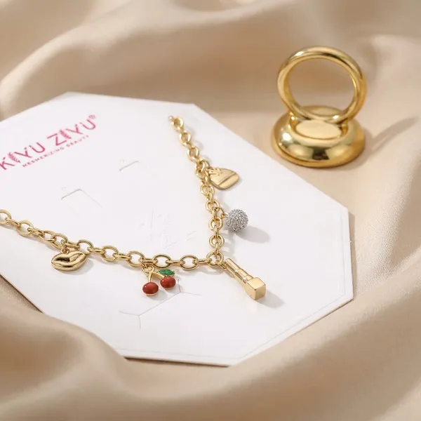 Gold-Toned_Charm_Necklace_With_Fruit_&_Beauty_Pendants