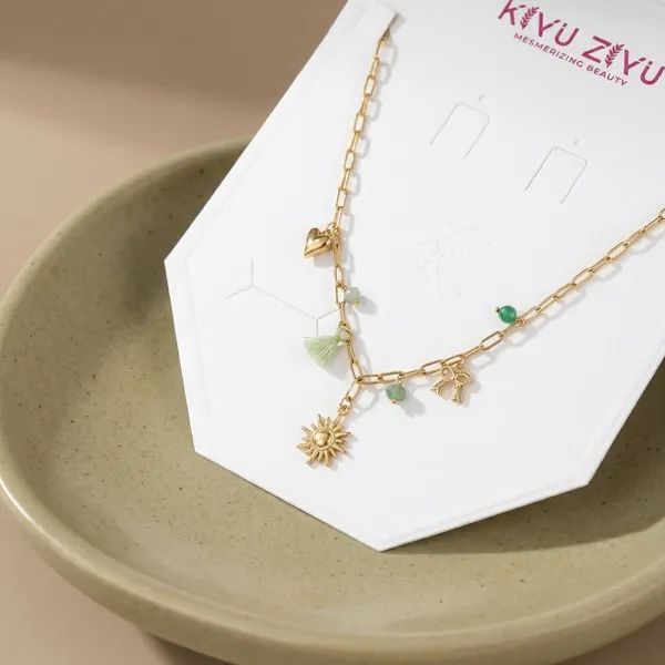 Gold-Tone_Charm_Necklace_With_Green_Bead_Accents_And_Sun_Pendant