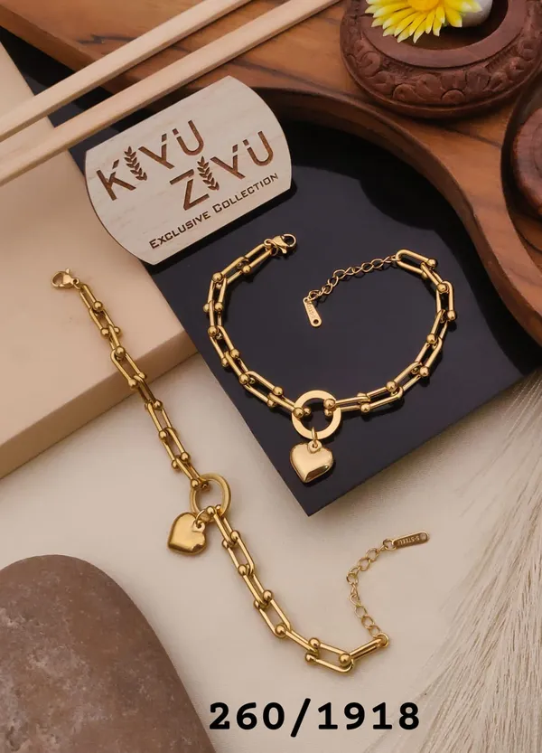 Kivu_Zivu_Exclusive_Collection_Gold-Toned_Heart_Charm_Chain_Bracelet_Set