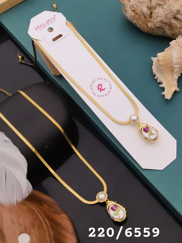 Gold_Chain_Necklace_With_Pearl_And_Pink_Gemstone_Pendant