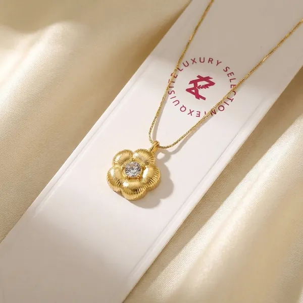 Gold-Toned_Flower_Pendant_Necklace_With_Crystal_Center