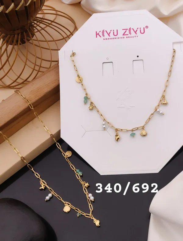 Golden_Charm_Necklace_With_Turquoise_Beads_And_Shell_Pendants