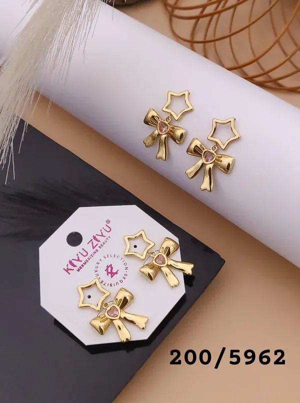 Golden_Star_And_Bow_Stud_Earrings_With_Pink_Stone_-_Kyuzizu