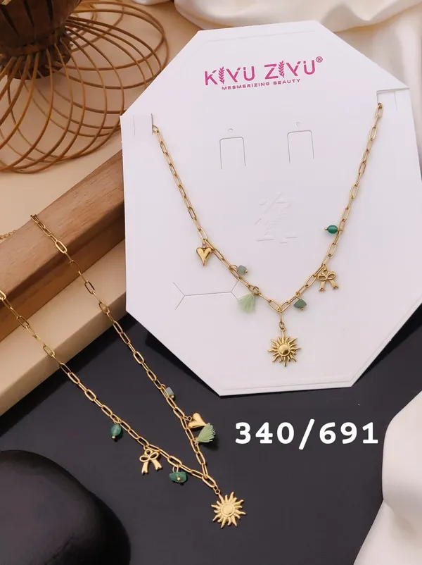 Gold-Tone_Charm_Necklace_With_Green_Bead_Accents_And_Sun_Pendant