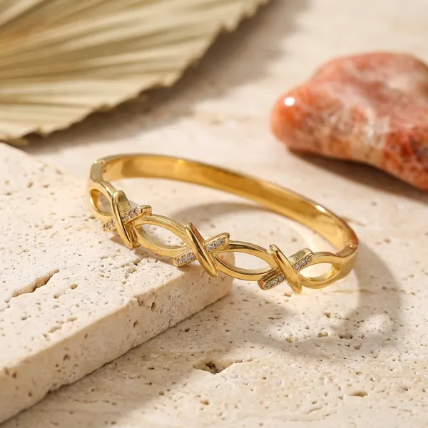 Elegant_Gold-Toned_Infinity_Design_Bangle_With_Crystal_Accents