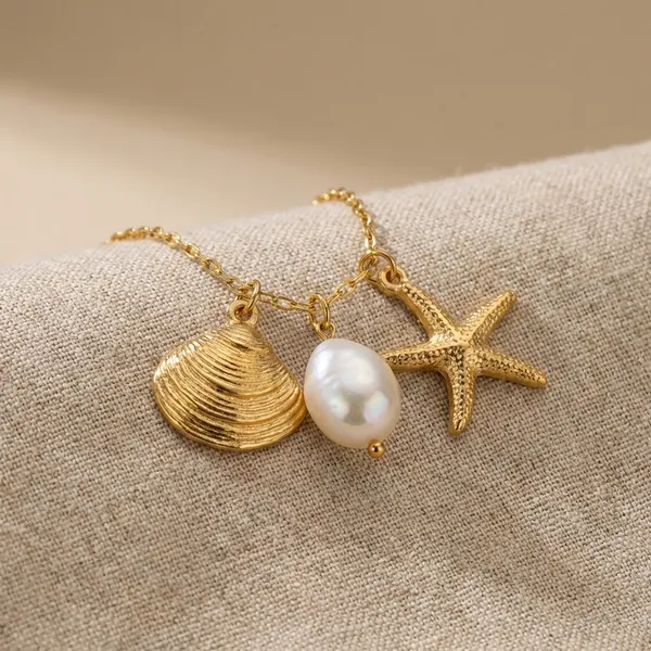 Kiviu_Ziviu_Exclusive_Collection_Starfish_And_Shell_Charm_Bracelet_With_Pearl_Beads_-_Gold_Tone