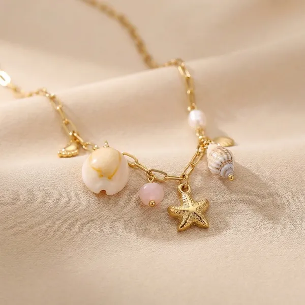 Kivu_Zivu_Gold_Chain_Necklace_With_Seashell_And_Starfish_Charms