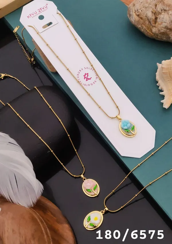 Elegant_Gold-Tone_Chain_Necklace_With_Floral_Enamel_Pendant_Set_Of_3