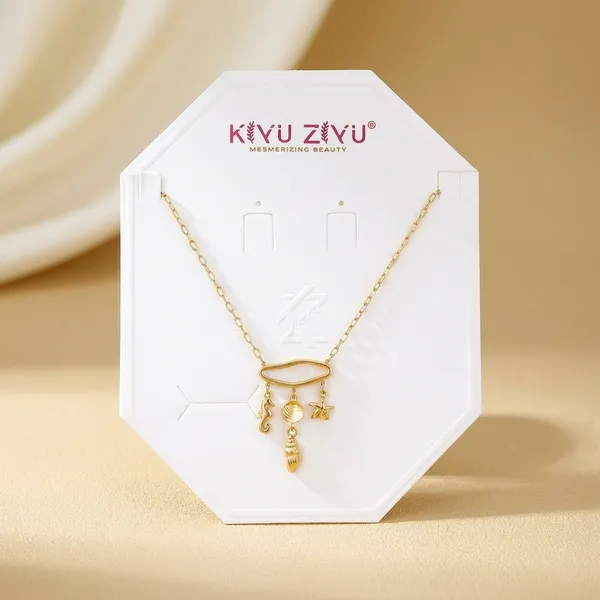 Gold-Toned_Charm_Pendant_Necklace_With_Hanging_Accents